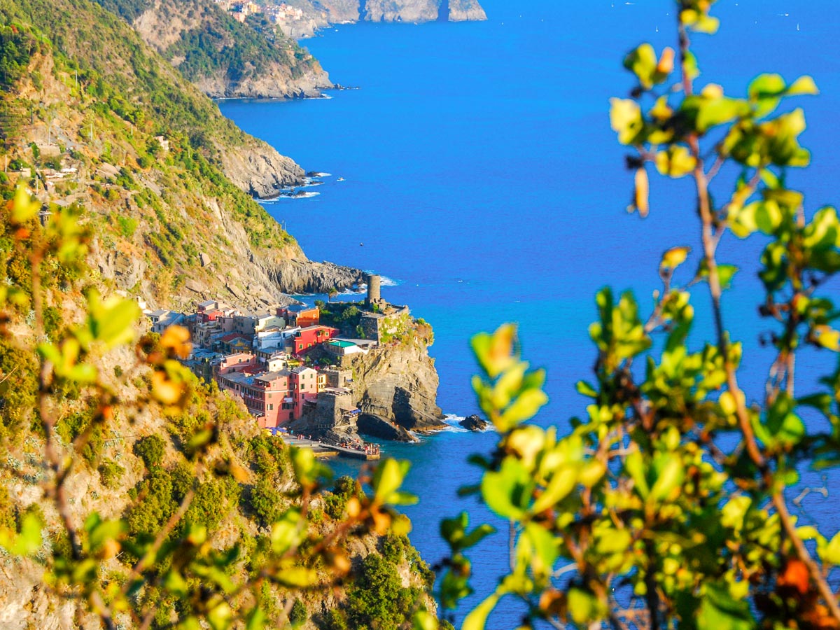 Looking at the blue waters of Mediterranean sea on self guided trek between Portofino and Porto Venere in Cinque Terre