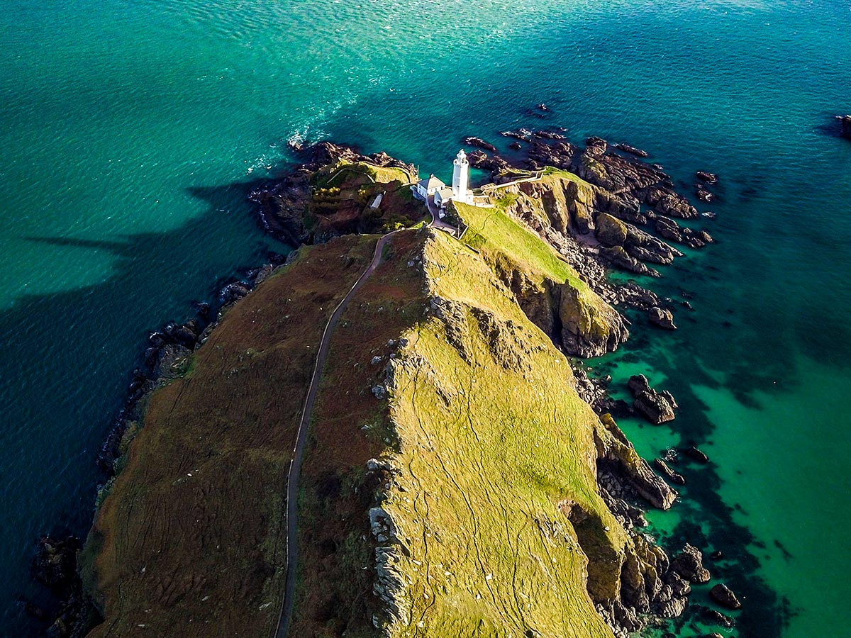 Aerial view of the Star Point Lighthouse that you get to pass while on South Devon Coast Trekking Tour