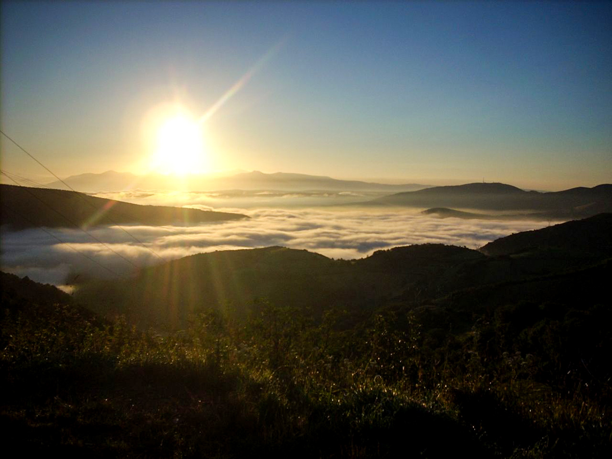 Clouds covering the valley below on self guided Cycling the Portuguese Way Tour