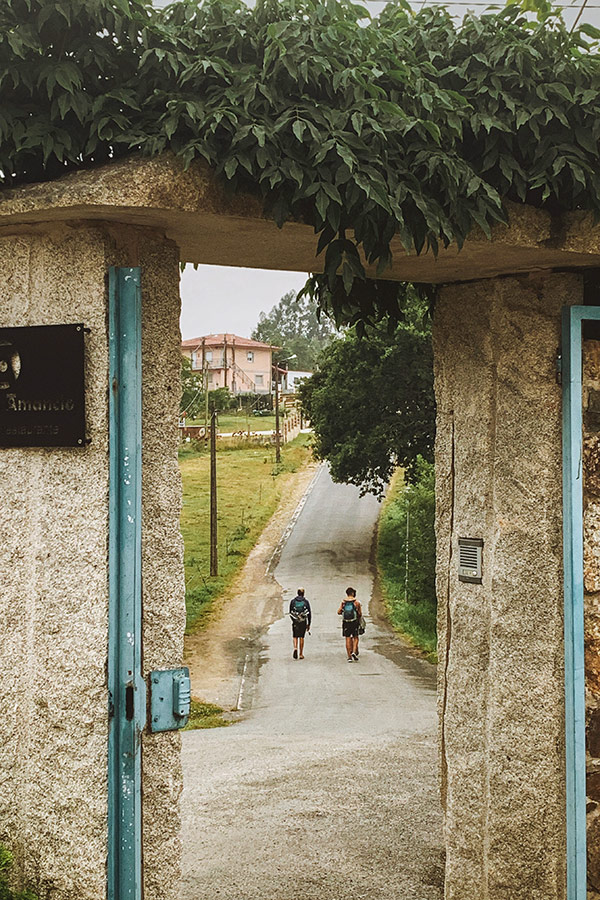 Two trekkers walking the French Camino as seen on self guided biking tour