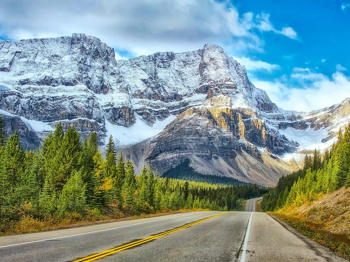 Riding on Icefields Parkway on a guided tour in Alberta and British Columbia Canada