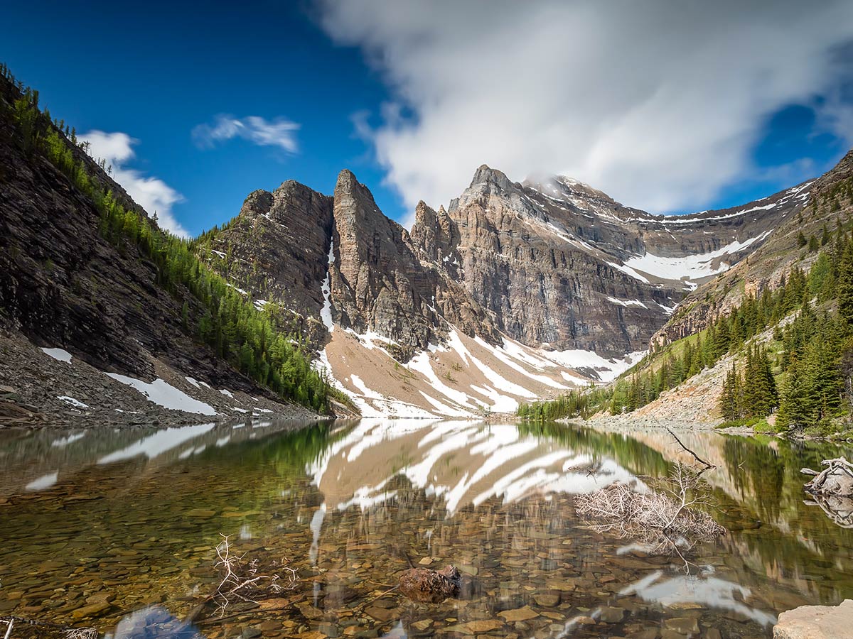 Beautiful mountain reflections in Lake Agness Banff National Park