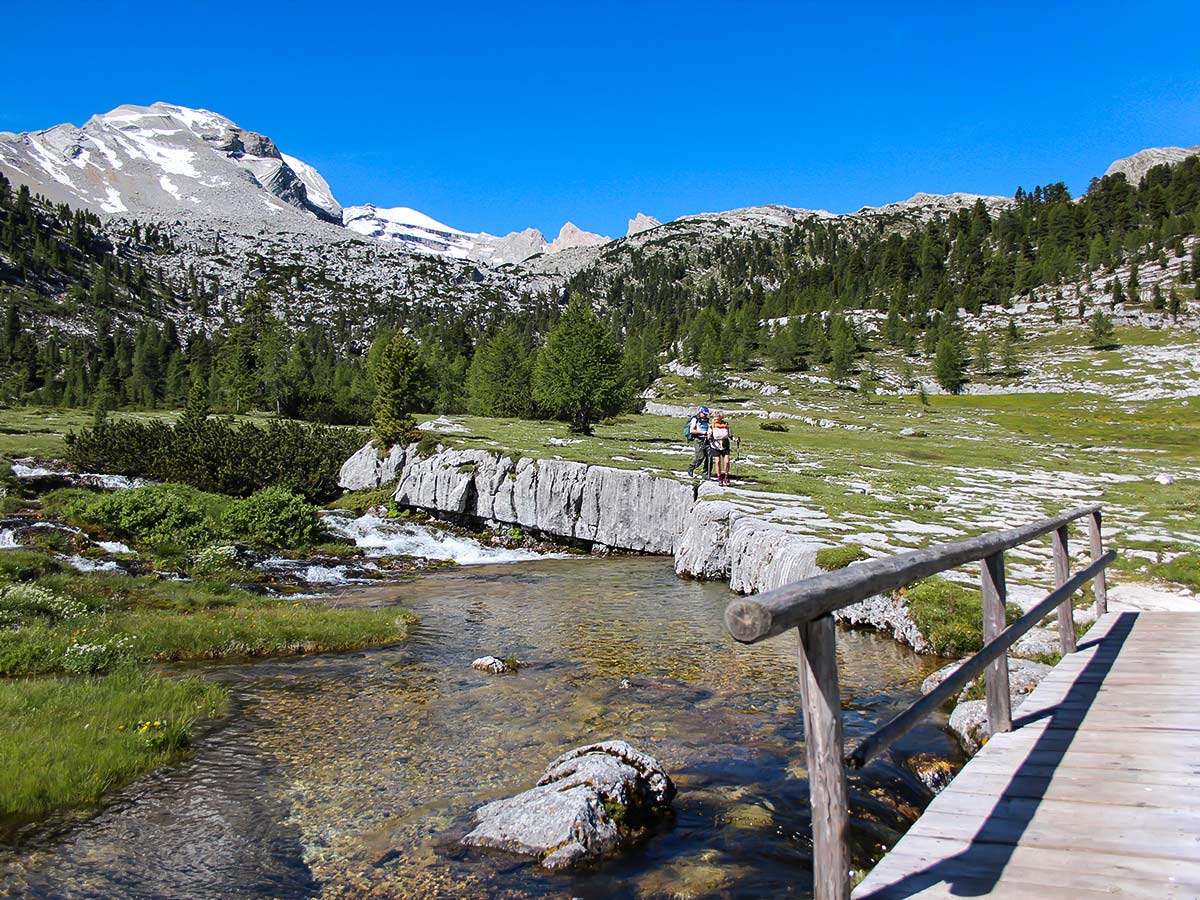 Two hikers near the bride on Alta Via Italy