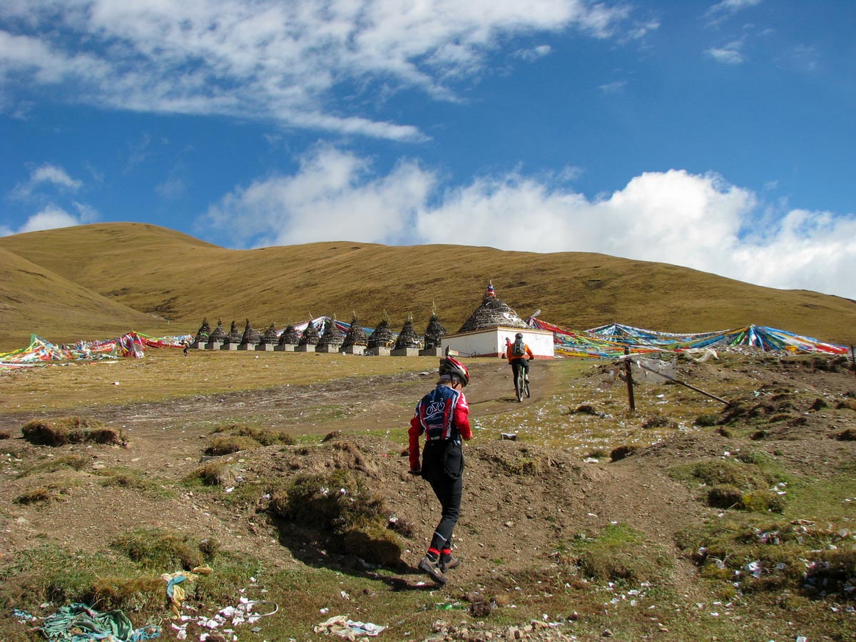 Bikers climb Holy Mountain of Amnye Machen in Tibet