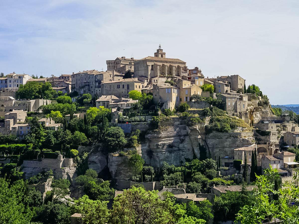 Village built on cliffs in France seen along Luberon walking tour