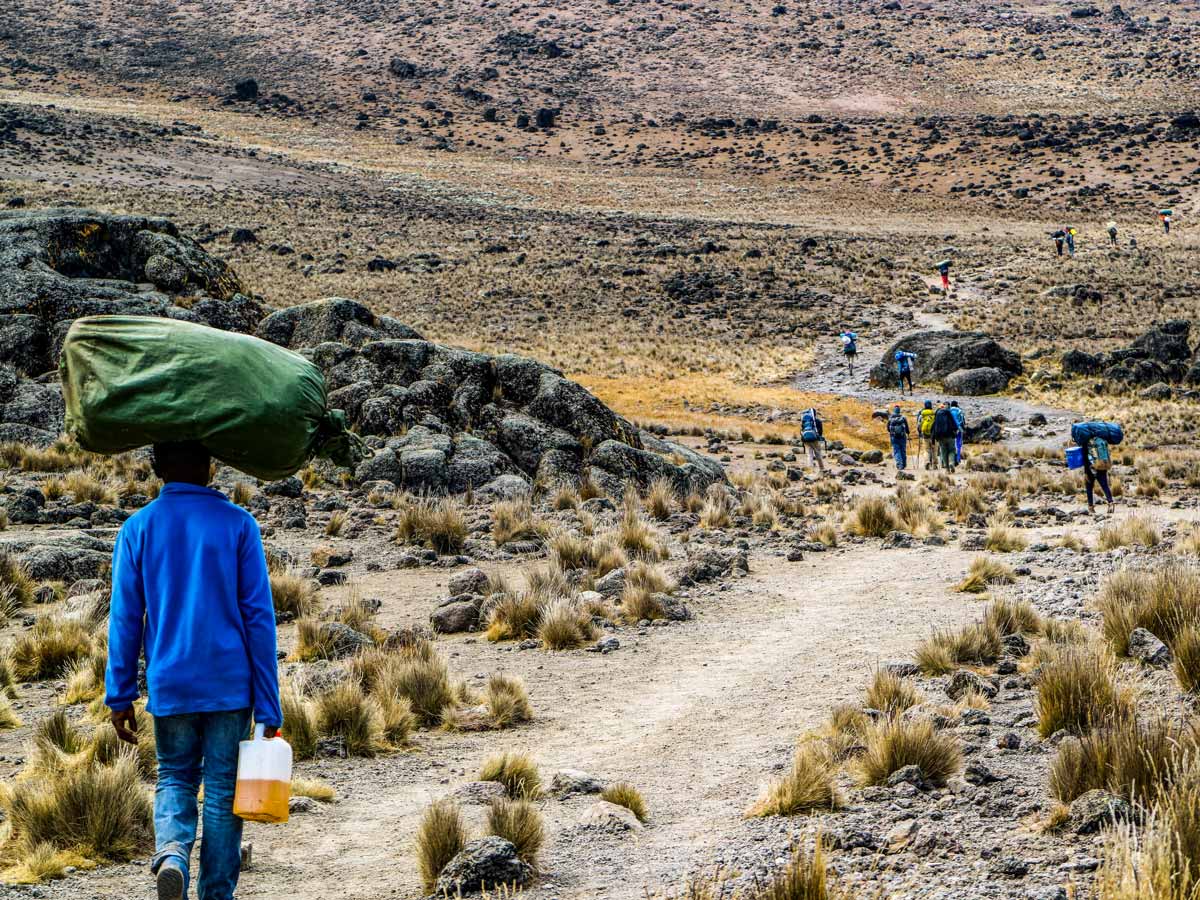 Machame trail hiking locals in Tanzania