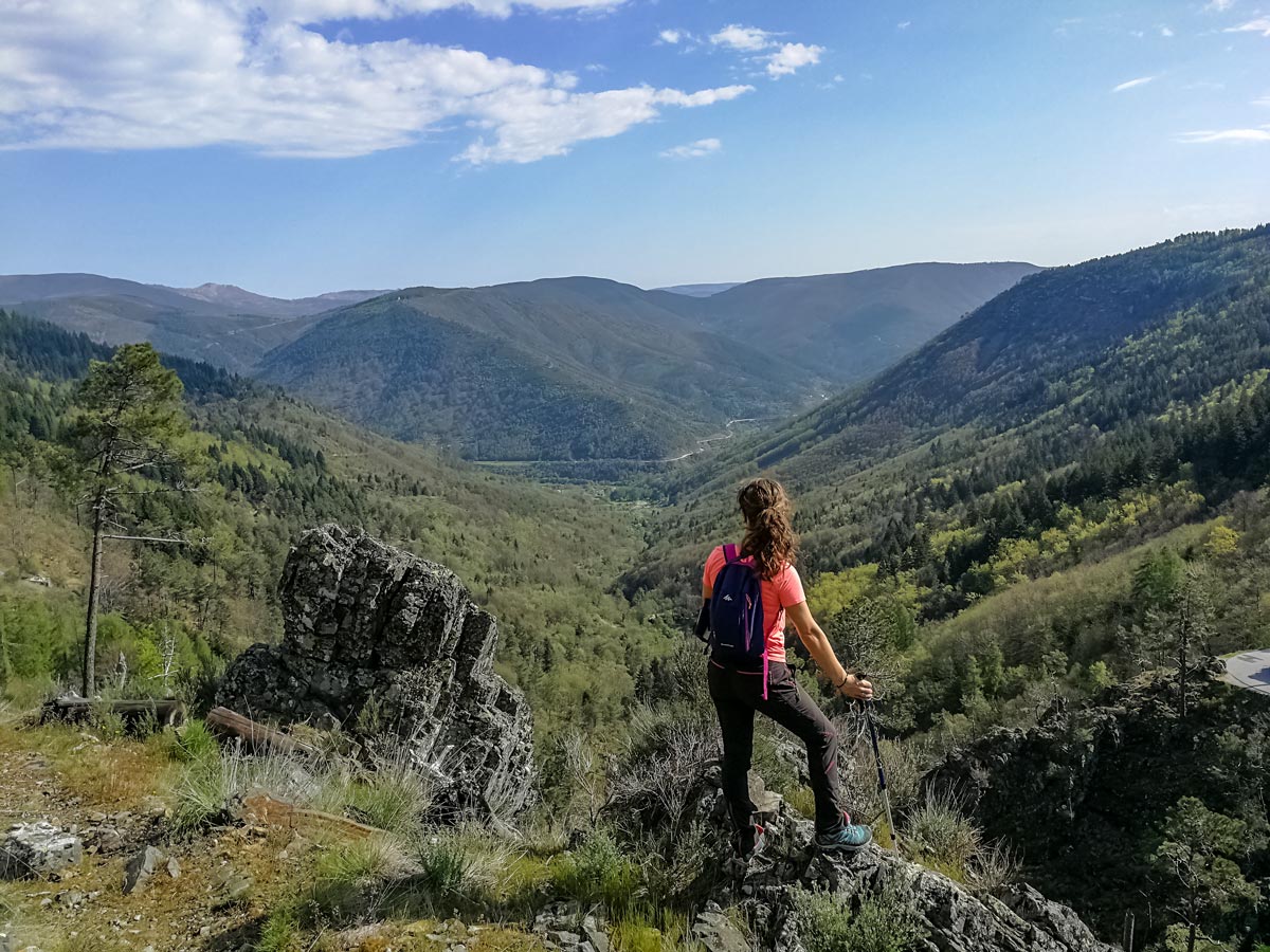 Hiker looking out to valley Serra da Estrela walking hiking tour Spain