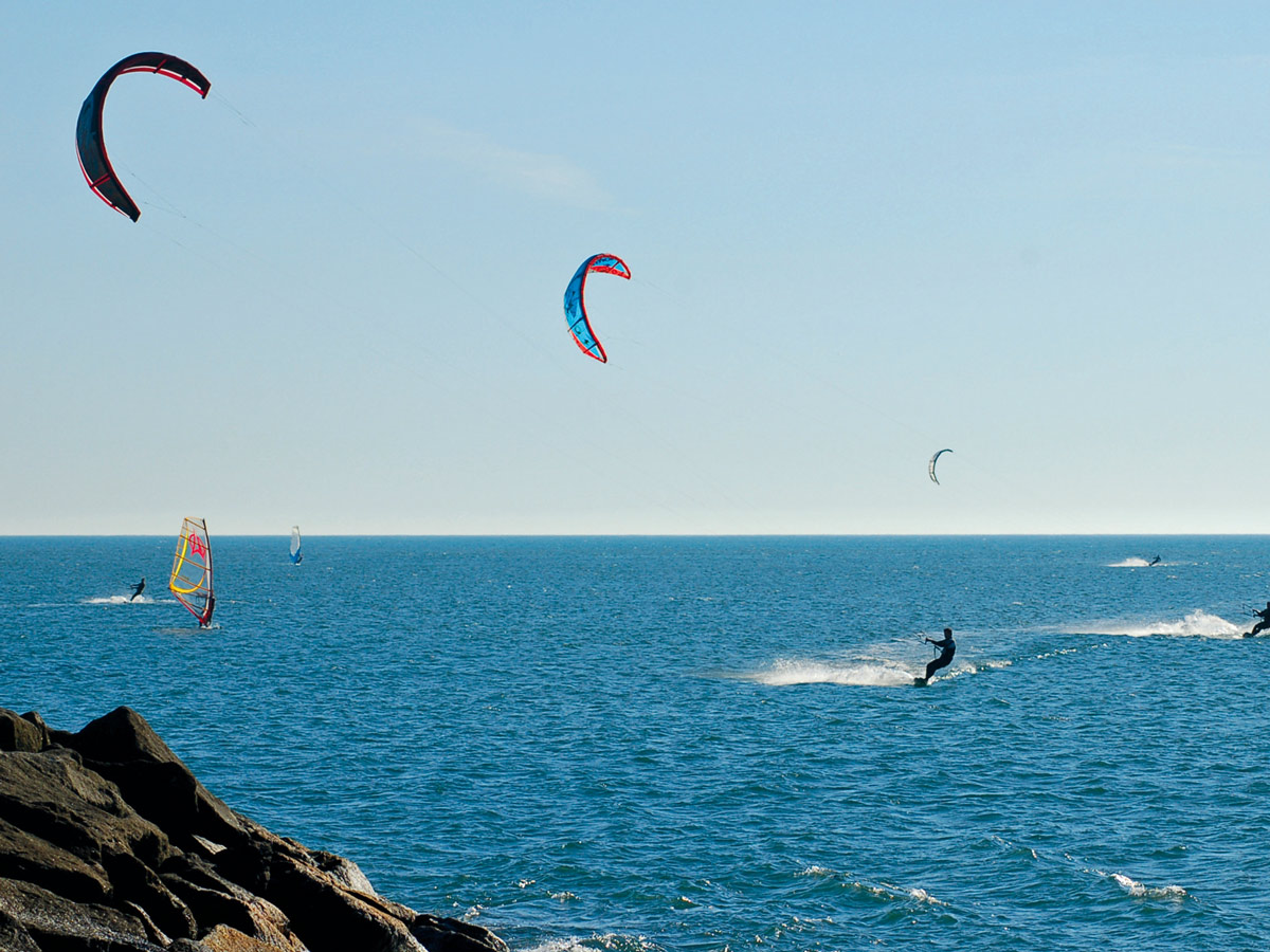 Wind surfers on the ocean