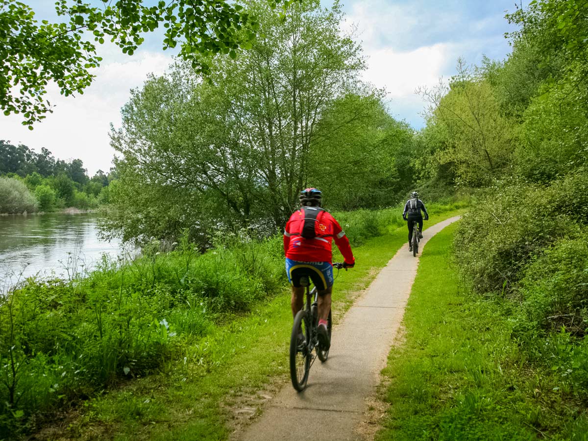 Biking by the river adventure family bike tour Minho Portugal