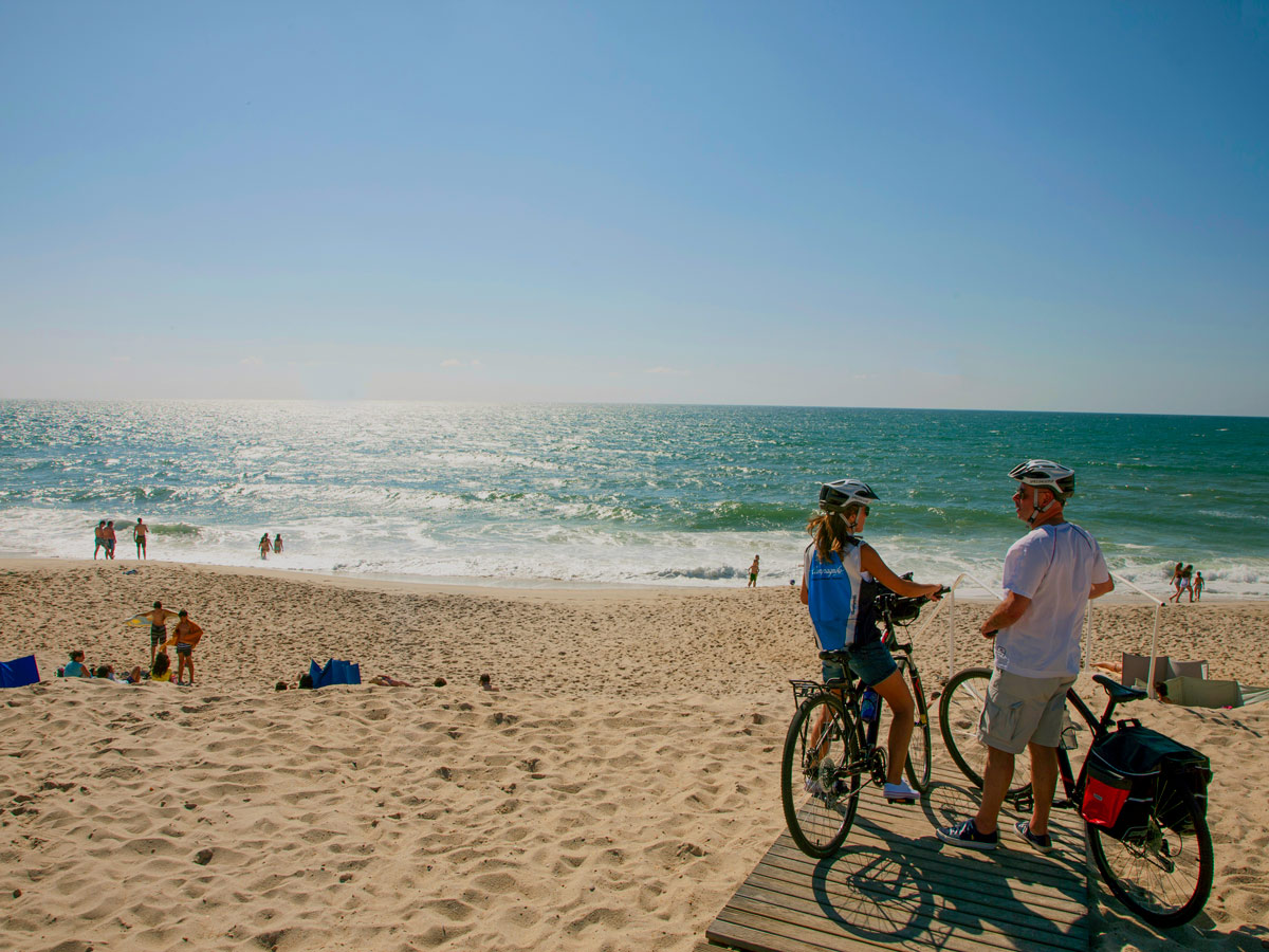 Biking by beautiful sea ocean Portugal bike tour to Porto to Coimbra