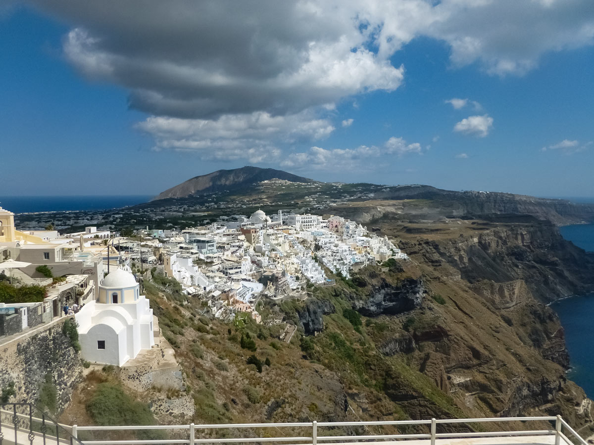 Coastal cities Naxos and Santorini exploring Greece