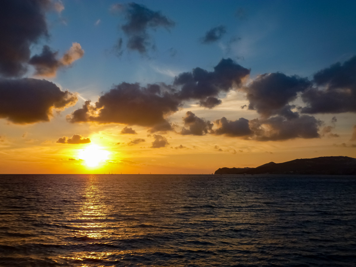 Beautiful mediterranean sunset Naxos and Santorini exploring Greece