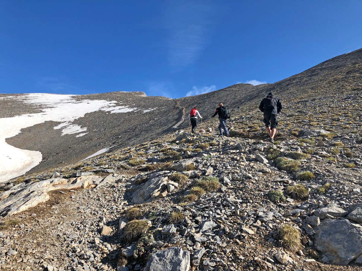 Group team hiking Mount Olympos trekking adventure northern Greece