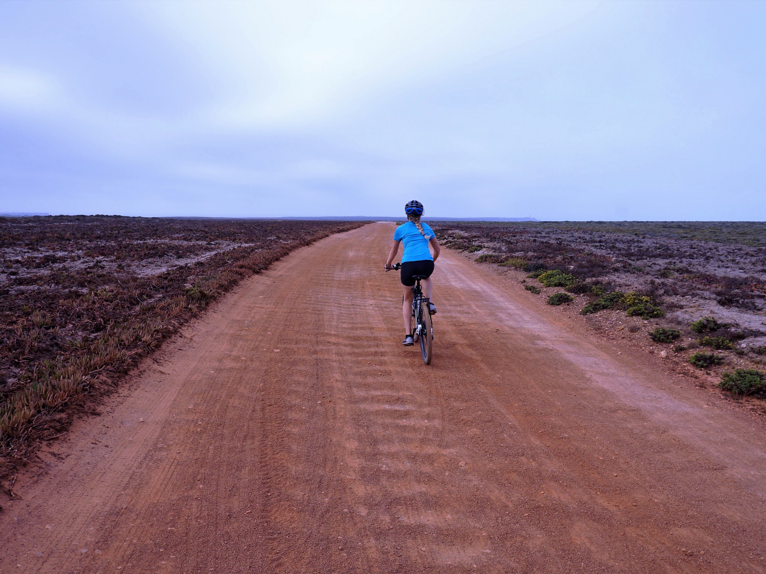 Biker riding on the gravel roads near Algarve