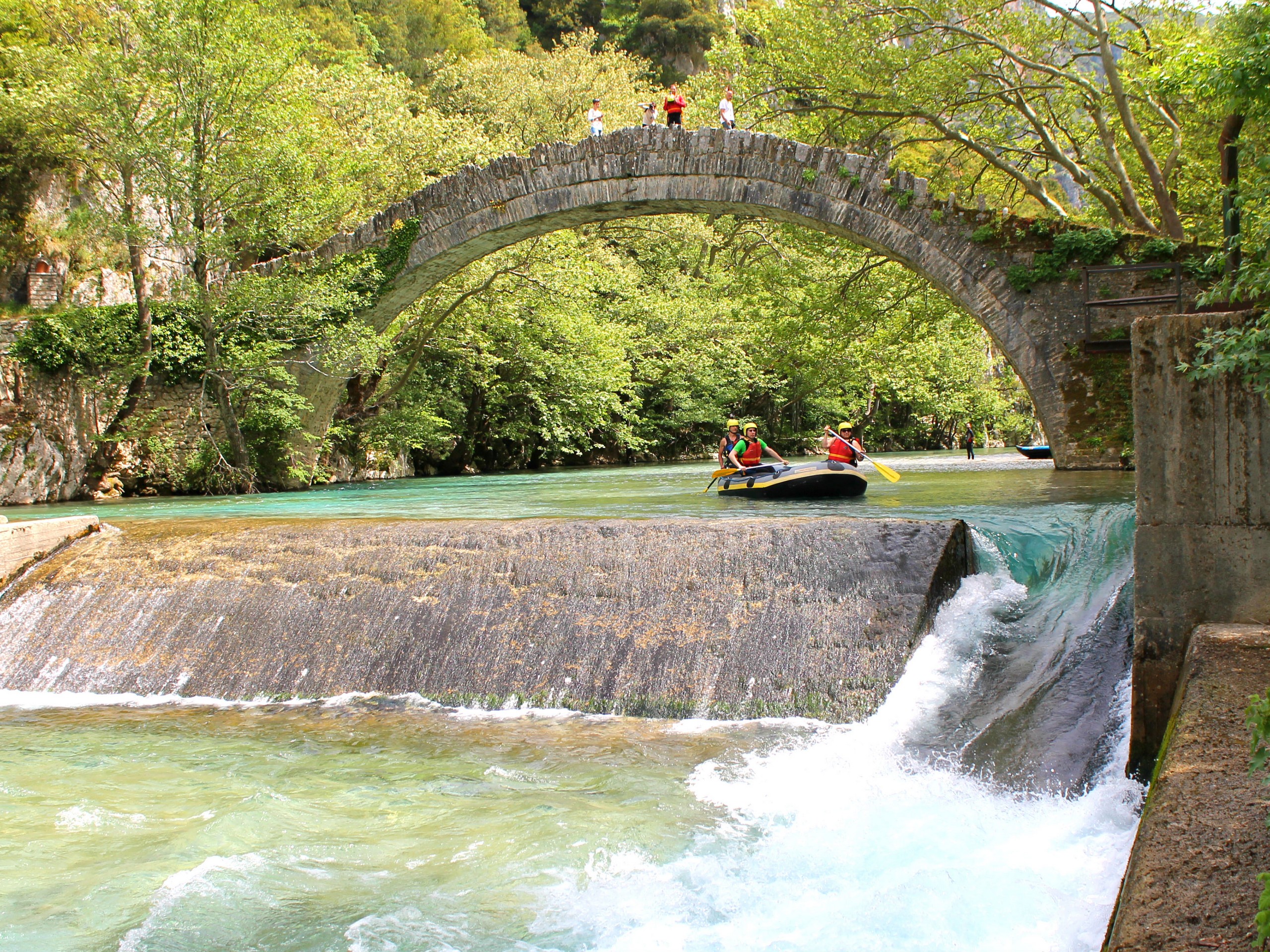 Rafting under the bridge in Greece