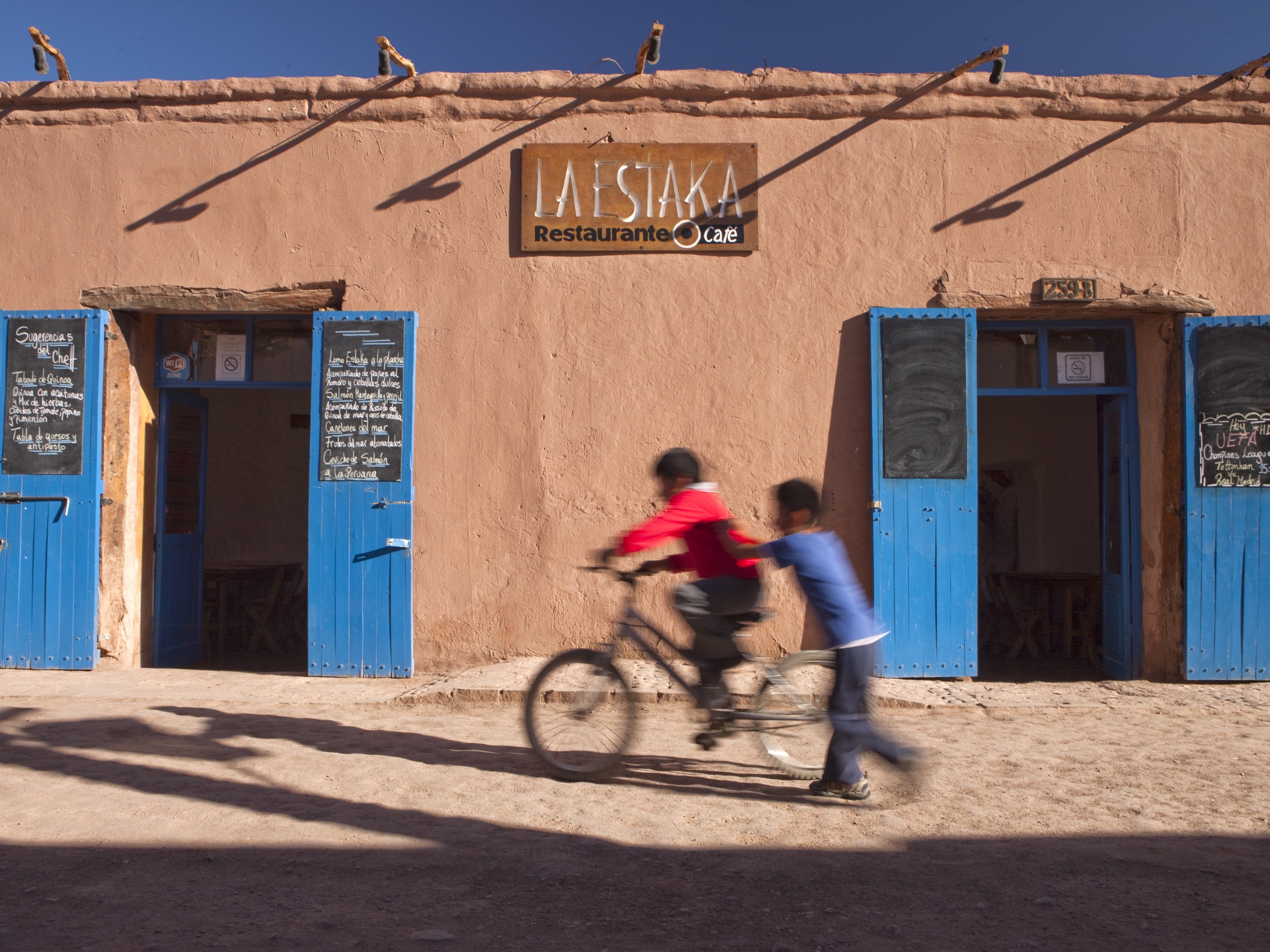 Two children playing in streets of Chile