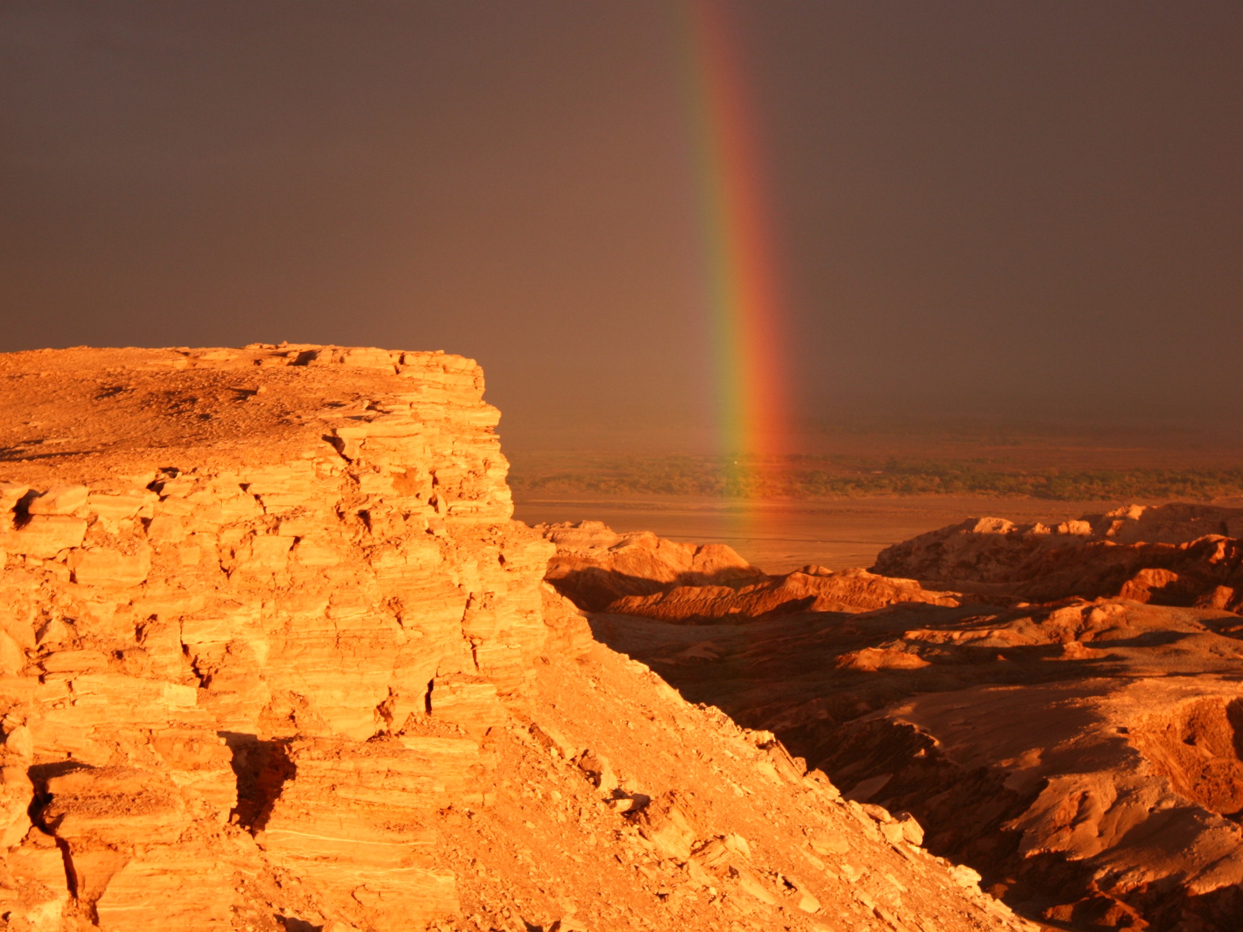 Rainbow over the stunning canyons in Chile