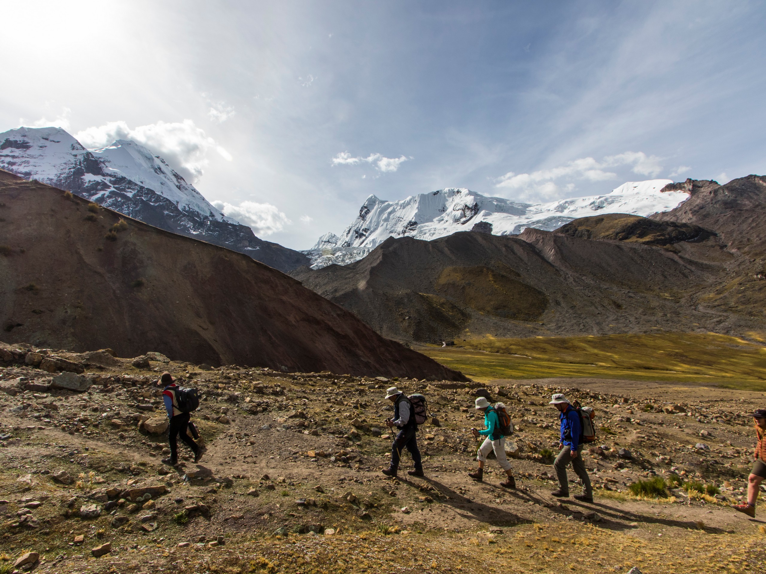 Group of trekkers hiking in Ausangate region