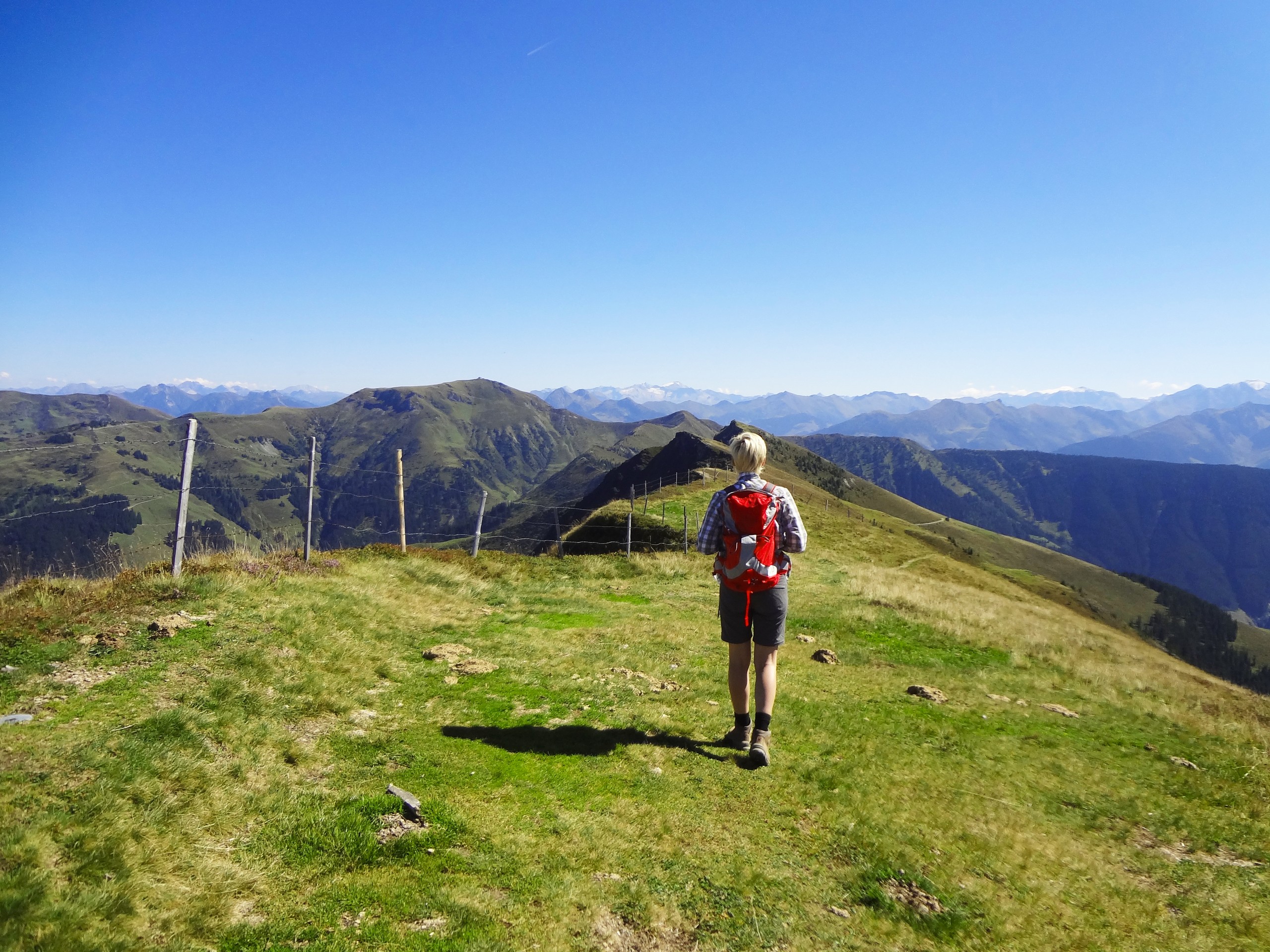 Walker on a ridge in Zell am See region