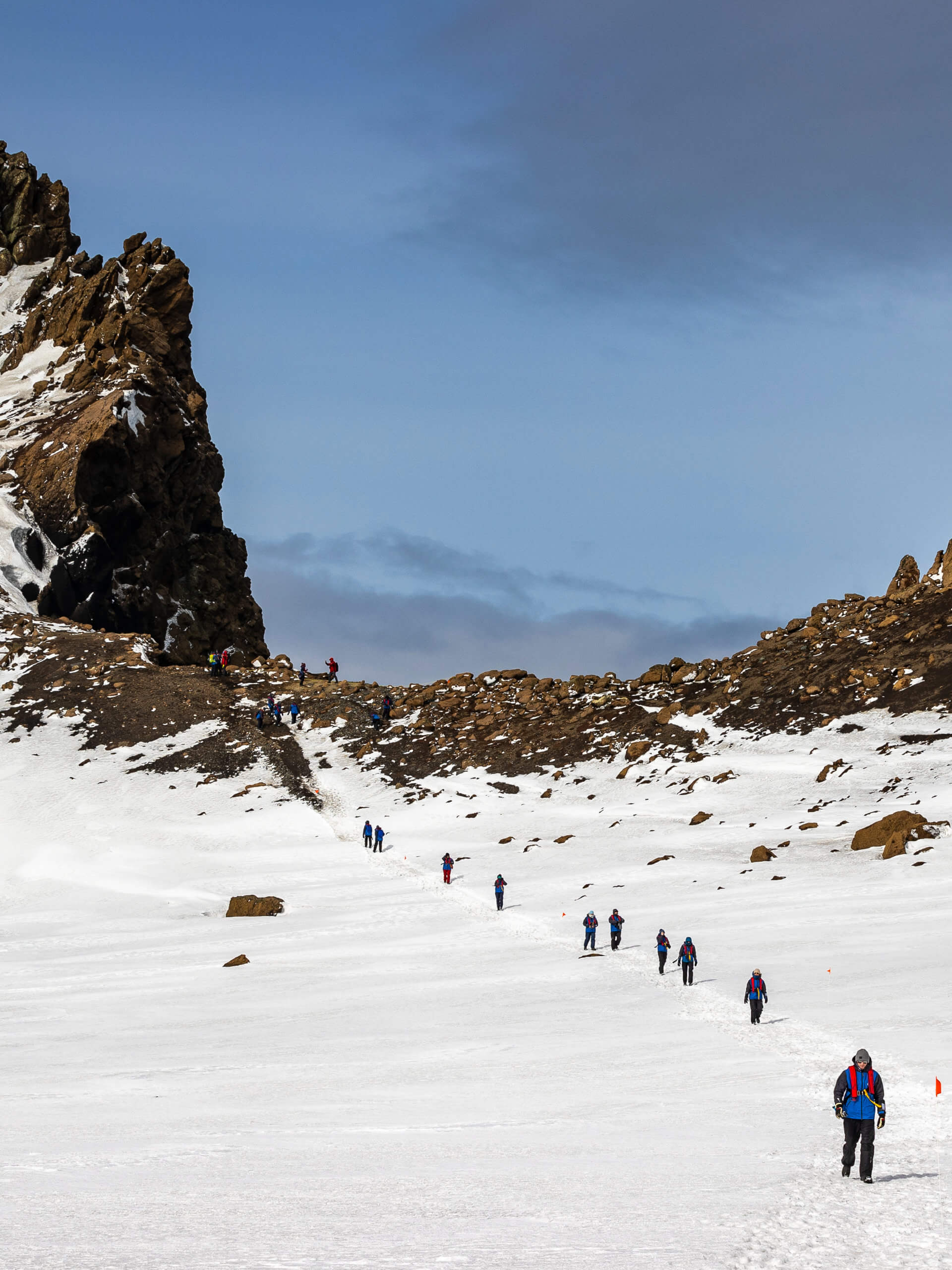 Passengers walking down from Neptune's Window, Deception Island, South Shetland Islands